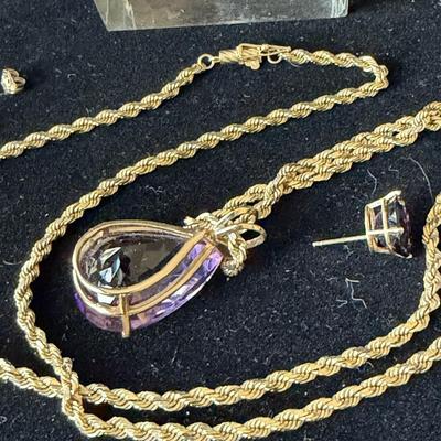 Sale Photo Thumbnail #8: Pierced earrings, 11mm x 9mm x 6.5 mm, ~ 3.45 ct weight each.  14k gold
Necklace is 24" 14k gold, amethyst is 17.70mm x 25.8mm x 12.8 mm, ~ 27 ct weight, in 14k gold setting 
Very nice condition