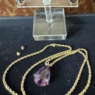 Sale Photo Thumbnail #7: Pierced earrings, 11mm x 9mm x 6.5 mm, ~ 3.45 ct weight each.  14k gold
Necklace is 24" 14k gold, amethyst is 17.70mm x 25.8mm x 12.8 mm, ~ 27 ct weight, in 14k gold setting 
Very nice condition