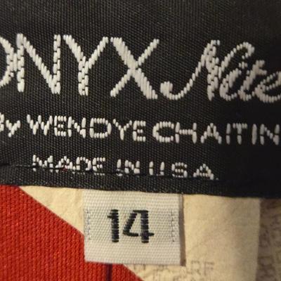 LOT 21: Two Dresses Sz. 14