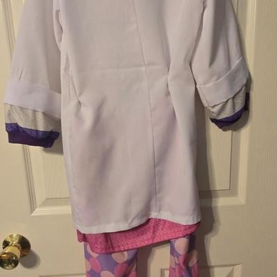 LOT 23: Child Size Dorothy Dress and 2 Disney Store Doc McStuffins Costumes