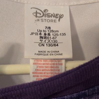 LOT 23: Child Size Dorothy Dress and 2 Disney Store Doc McStuffins Costumes