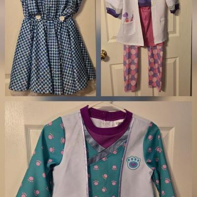 LOT 23: Child Size Dorothy Dress and 2 Disney Store Doc McStuffins Costumes