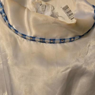 LOT 23: Child Size Dorothy Dress and 2 Disney Store Doc McStuffins Costumes