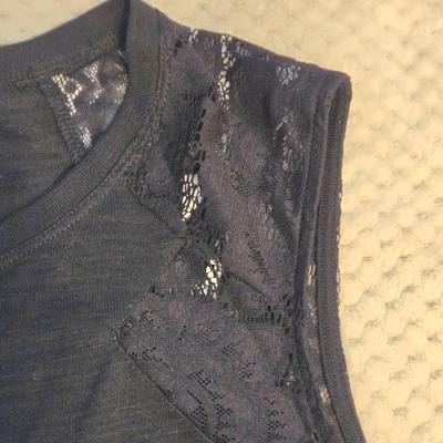 LOT 32: Women's Plus Size Colorful Tops Including Teal Cold Shoulder, Orange Ruffles, and More