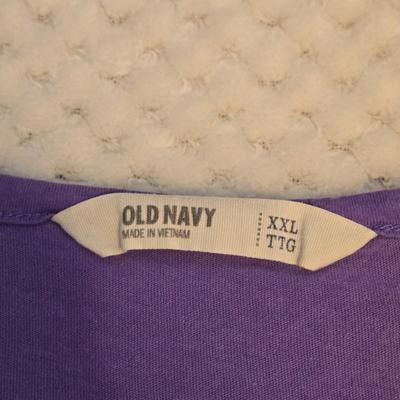 LOT 32: Women's Plus Size Colorful Tops Including Teal Cold Shoulder, Orange Ruffles, and More