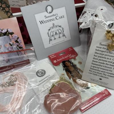 Sale Photo Thumbnail #19: Miscellaneous official American Girl accessories (many with the original box)
Includes the book, Victorian Lemonade set with additional settings, Ice Cream Maker, brooch, pin, coin purse, sticker, small purse
and the cake!  All items pictured are included