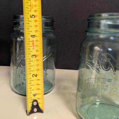 Pair Of Glass Ball Jars