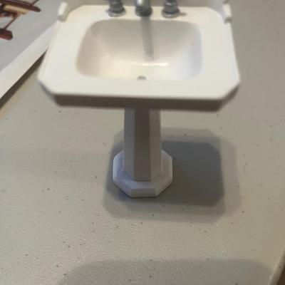 Porcelain doll sink