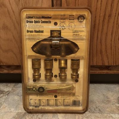 LOT 126: Orbit Brass Manifold Set Multi Hose Connector, Craftsman Precision Drill Guide, Brass Door Lock & a Drill Mount