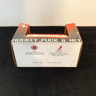 LOT 137: Sports Collection - Flyer's Stanley Cup Puck and Net / Puzzle, Golf Clock, Buick Super Bowl XXV Silver Anniversary Trading...