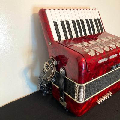 LOT 138: J. Meister Red Accordion with Carrying Case and Key