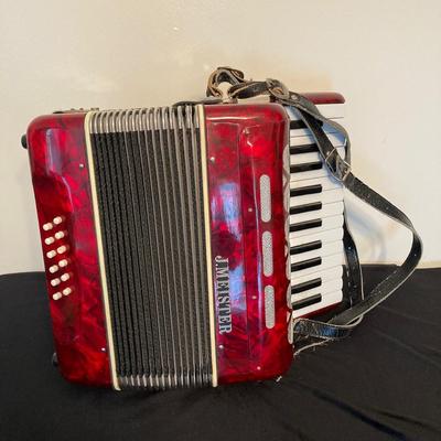 LOT 138: J. Meister Red Accordion with Carrying Case and Key