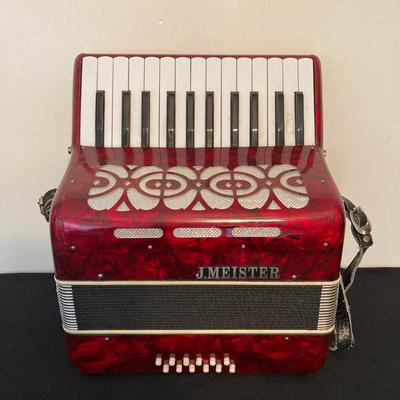 LOT 138: J. Meister Red Accordion with Carrying Case and Key