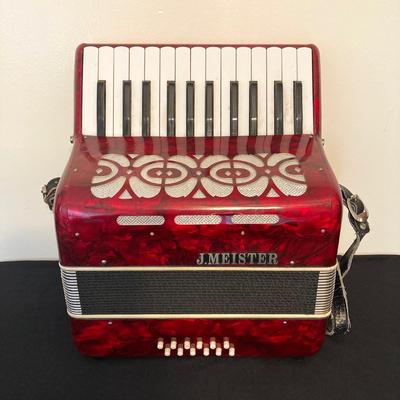 LOT 138: J. Meister Red Accordion with Carrying Case and Key