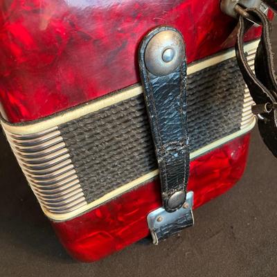 LOT 138: J. Meister Red Accordion with Carrying Case and Key