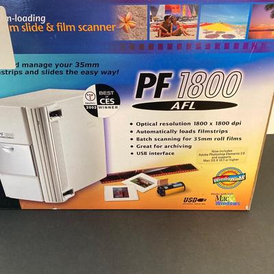 LOT 140: Microtek ScanMaker V310, PF 1800 AFL 35mm Slide & Film Scanner, McAfee Virus Scan, Milonit Hebrew - English Dictionary