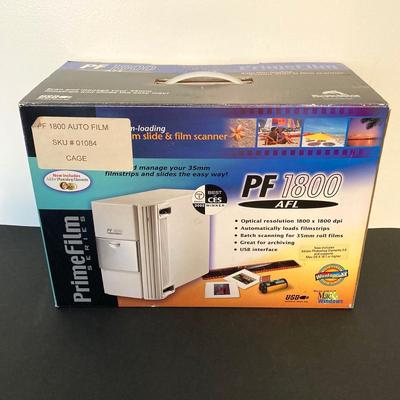 LOT 140: Microtek ScanMaker V310, PF 1800 AFL 35mm Slide & Film Scanner, McAfee Virus Scan, Milonit Hebrew - English Dictionary