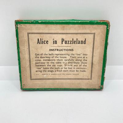 LOT 147: Vintage This and That Collection - Longaberger Mug, Alice in Puzzleland / Pondsnag Puzzles, The Barclay Philadelpha Glass...