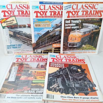 LOT 166: Vintage Marx Coal Tender and NYC Caboose with Other Metal O Gauge Train Cars, Metal Track & Train Magazines