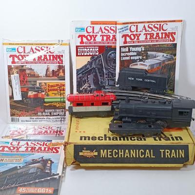 LOT 166: Vintage Marx Coal Tender and NYC Caboose with Other Metal O Gauge Train Cars, Metal Track & Train Magazines