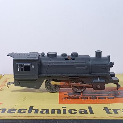 LOT 166: Vintage Marx Coal Tender and NYC Caboose with Other Metal O Gauge Train Cars, Metal Track & Train Magazines