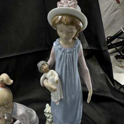 Sale Photo Thumbnail #508: 6 Lladro or Nao figurines all in perfect condition. No original boxes or COA. Can be shipped  double double boxed. These Lladros were part of a large collection from an avid Lladro fan. being sold now to benefit the family. The two clowns are made in Chin
