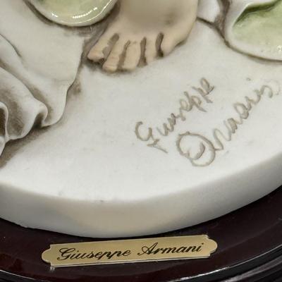 Sale Photo Thumbnail #67: This collectible figurine is in mint condition.  #1400 / 7500 Limited Edition
The porcelain figurine depicts a woman in a flowing green dress with doves/
From the Florence Sculpture d"Arte collection 
Retail's up to $1000
16 inches tall 
local pickup only