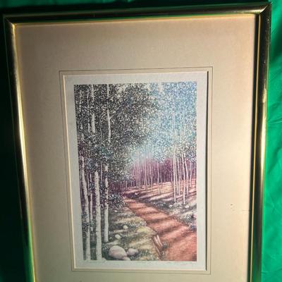 Framed Artwork Depicting a Forest Path Scene