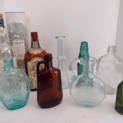 Assortment of Vintage Color Glass Collectible Bottles