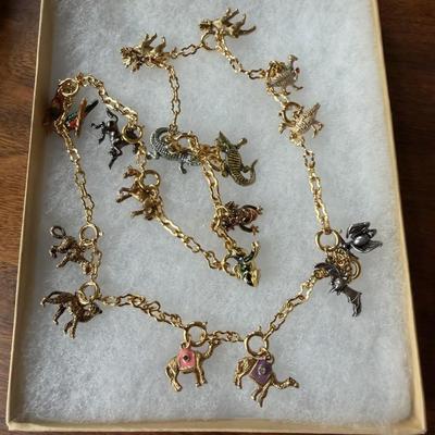 Sale Photo Thumbnail #108: Elk, Alligator, Frog, Horse, Parrot, Leopard, Camel. Bat, Goose
Joan Rivers Classic collection 
Great item to break apart for gifting.