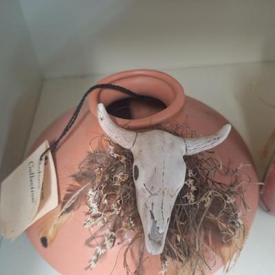 vintage native American art pottery- both are signed on bottom.