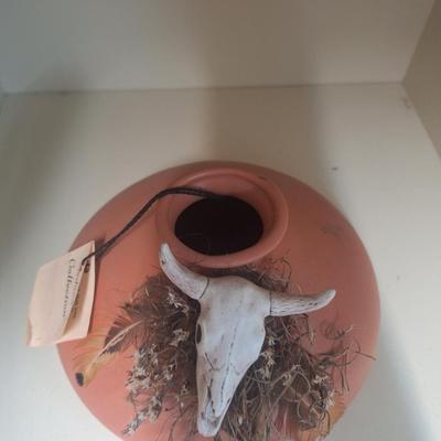 vintage native American art pottery- both are signed on bottom.