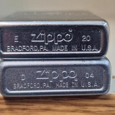 2 chrome Zippo lighters