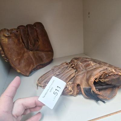 two vintage mitts- heavily used