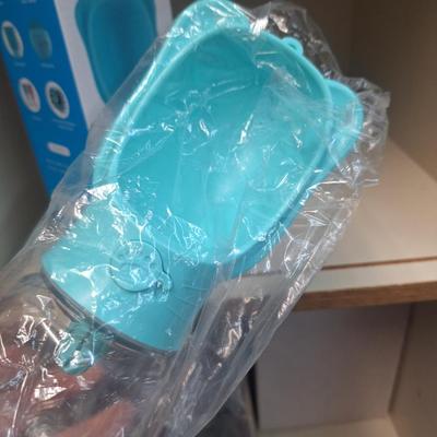 portable pet water bottle, hold it sideways so dog can lap water