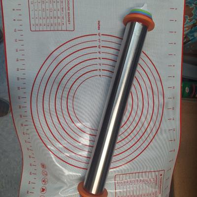 Stainless steel rolling pin and silicone mat