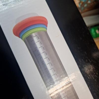 Stainless steel rolling pin and silicone mat