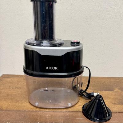 Sale Photo Thumbnail #625: Electric vegetable slicer. Comes with 2 slicing inserts.  Tested, runs smoothly and quietly. Near new condition.