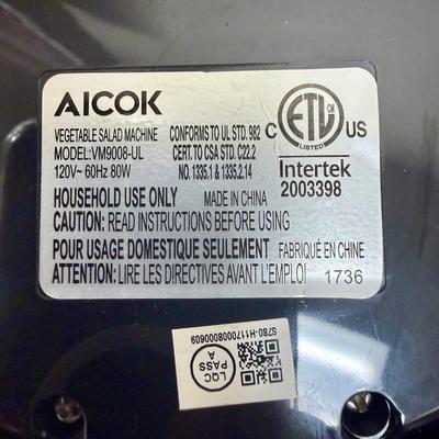 Sale Photo Thumbnail #627: Electric vegetable slicer. Comes with 2 slicing inserts.  Tested, runs smoothly and quietly. Near new condition.