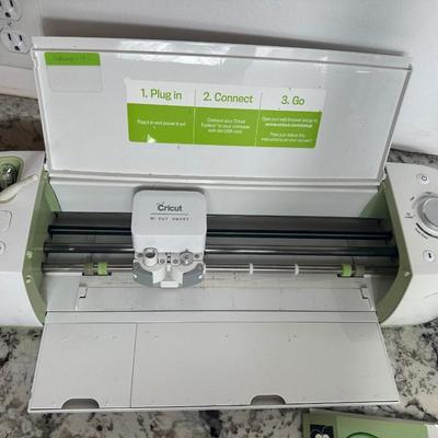 Cricut Lot: Two Cutting Machines with Cartridges, Tools & Supplies