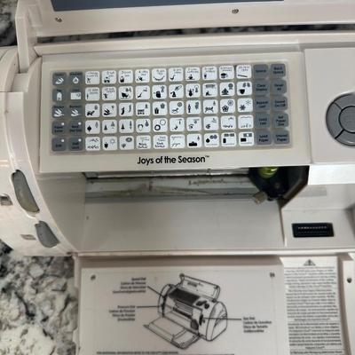 Cricut Lot: Two Cutting Machines with Cartridges, Tools & Supplies