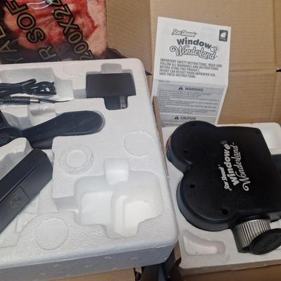 Star shower window wonderland projector system to have holiday lights projected on your house or other structure.