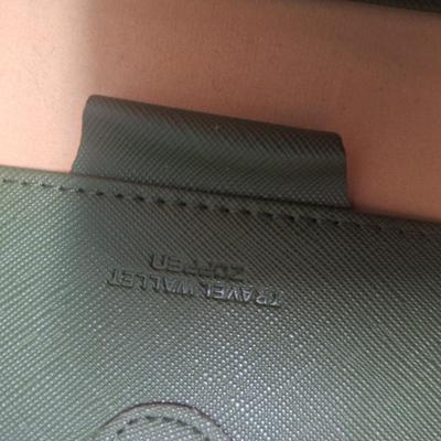 Faux leather green travel Zoppen travel wallet.