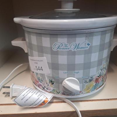 Pioneer Woman Sweet Romance Blossoms 1.5-quart slow cooker.  It's the small size perfect for dip.