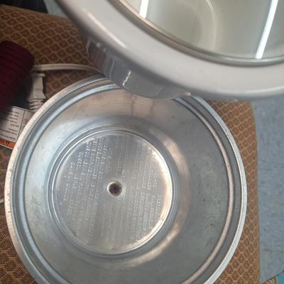 Pioneer Woman Sweet Romance Blossoms 1.5-quart slow cooker.  It's the small size perfect for dip.