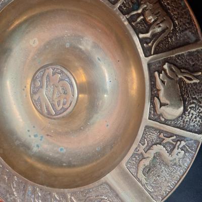vintage brass Chinese zodiac ashtrays. 
