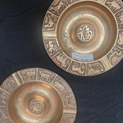 vintage brass Chinese zodiac ashtrays. 