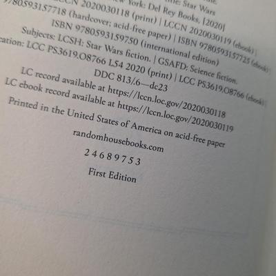 two hardcover Star Wars novels: Alphabet Squadron by Alexander Freed and Light of the Jedi by Charles Soule. Both appear to be First...