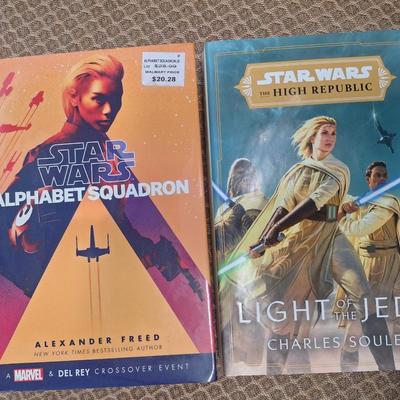 two hardcover Star Wars novels: Alphabet Squadron by Alexander Freed and Light of the Jedi by Charles Soule. Both appear to be First...