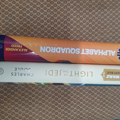 two hardcover Star Wars novels: Alphabet Squadron by Alexander Freed and Light of the Jedi by Charles Soule. Both appear to be First...